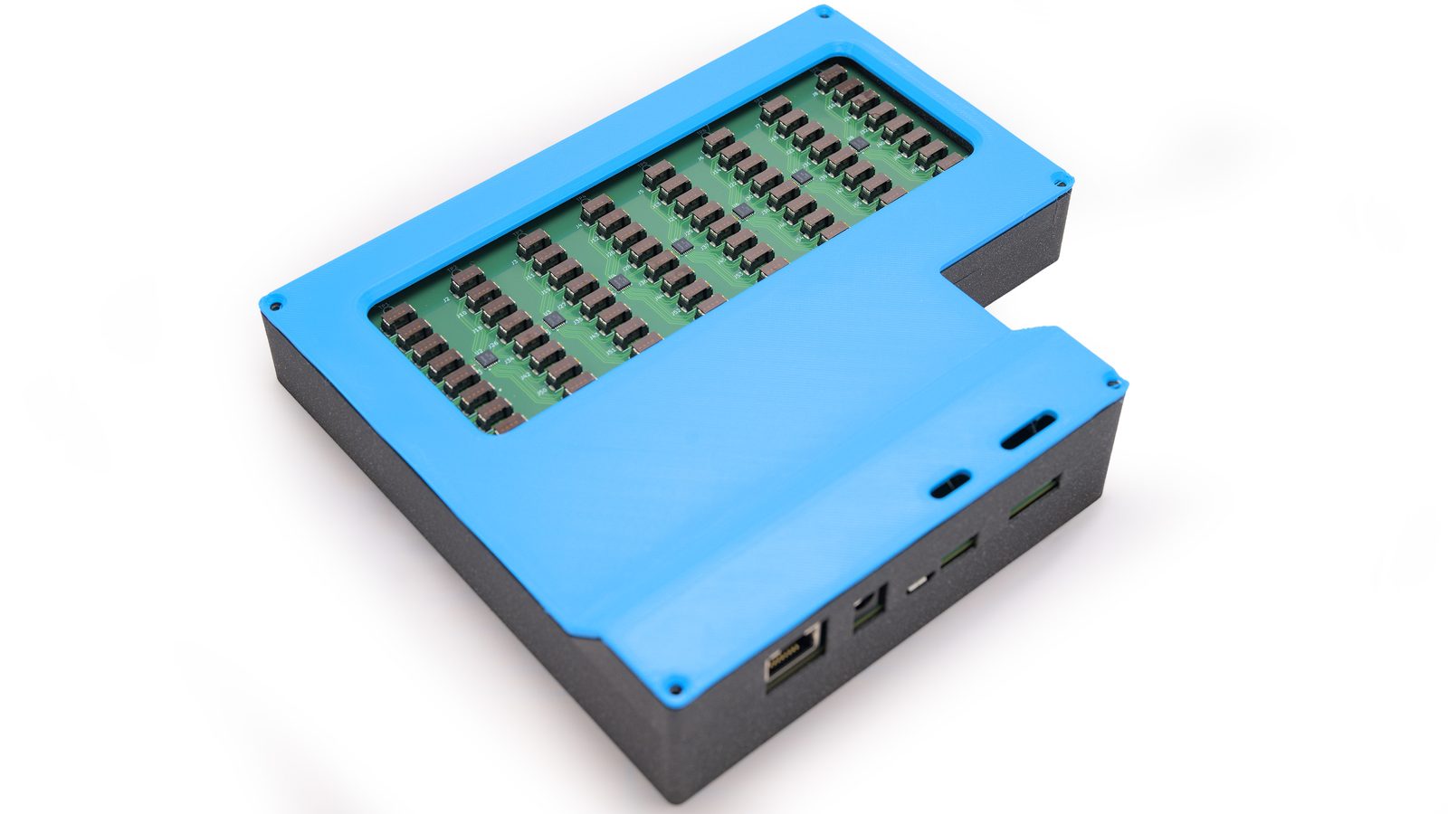 warecache container controller in a blue enclosure showing the grid of 64 sensor connectors and the Ethernet, barrel jack, and USB ports