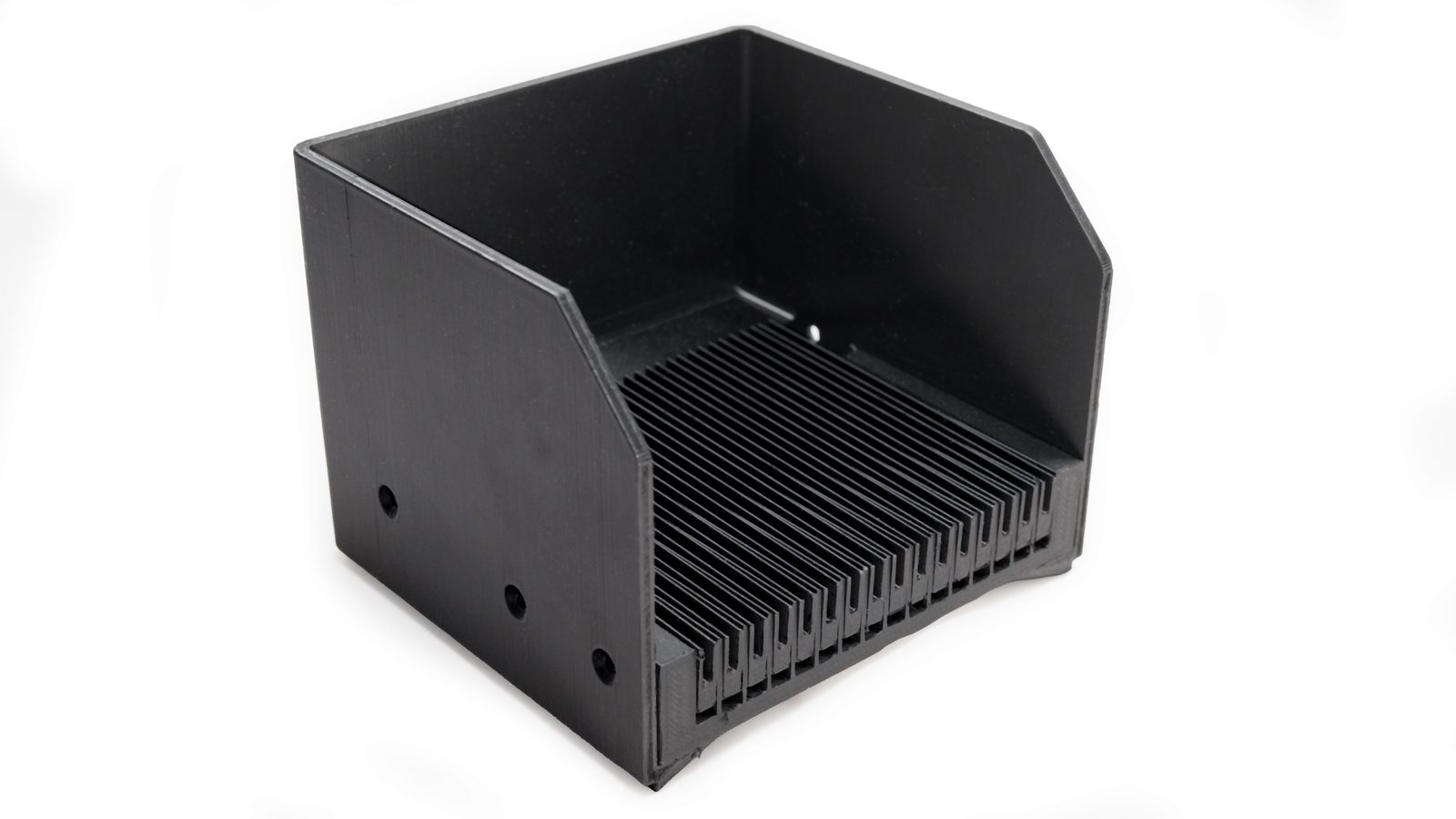 Small black switch sensor bin with sixteen slots in its floor
